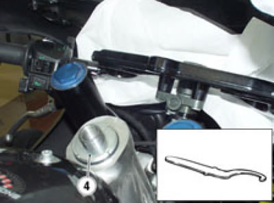 Slacken the adjusting ring (4) fully using a…