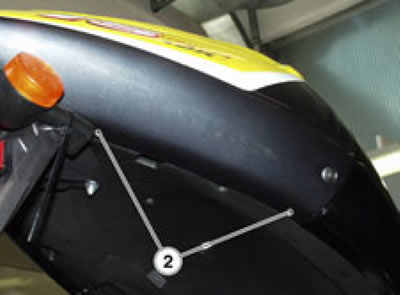 Release and remove the two screws (2) on both…