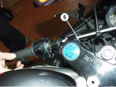 Remove the left handlebar.