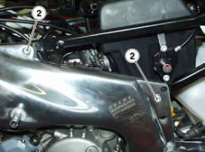 Remove the seat subframe.
