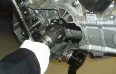 Rotate the crankshaft until the rear cylinder…