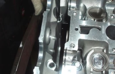 Undo and remove the two head fastener screws…