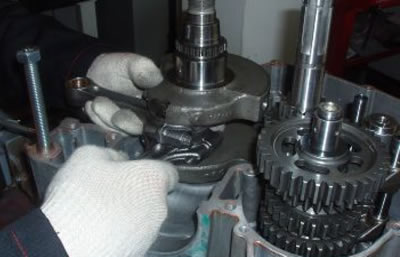 Place the left side crankcase half on the engine…