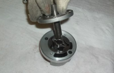 Slide off the shaft with the cover.