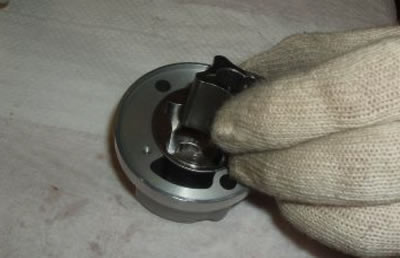 Remove the oil pump rotor.