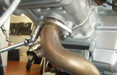 Unscrew and remove the two nuts on the head…