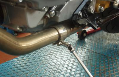 Remove the exhaust manifold.