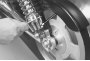 Rear shock absorbers — adjusting