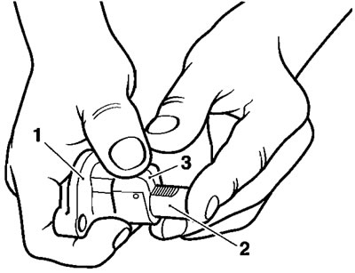 1. Натяжитель; 2. Плунжер натяжителя; 3. Собачка
